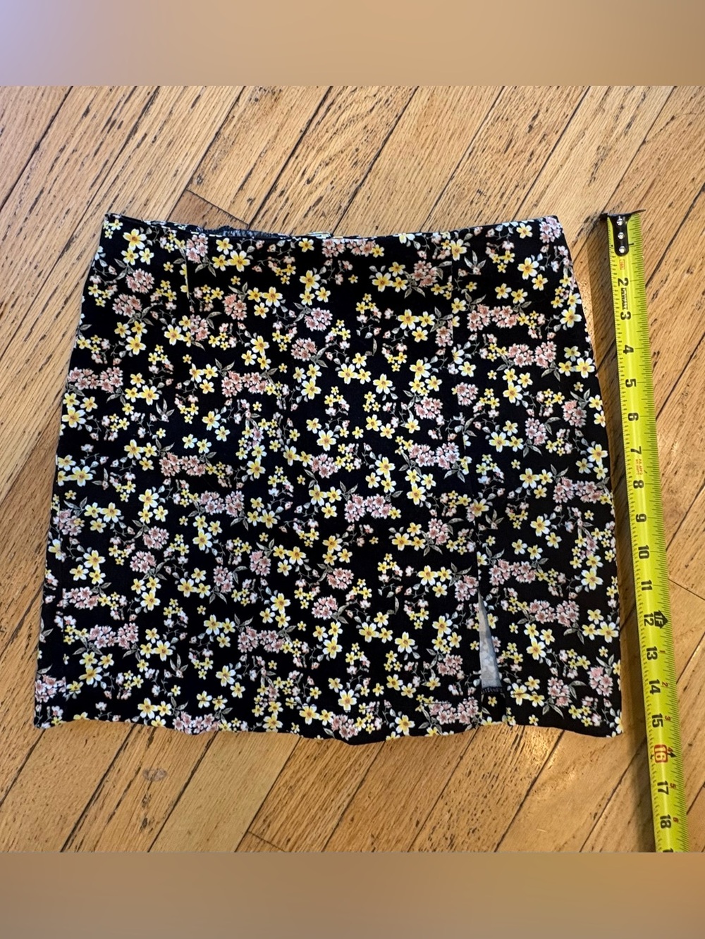 Floral Black Mini Skirt with Yellow & Pink Blossoms,  with small front slit.